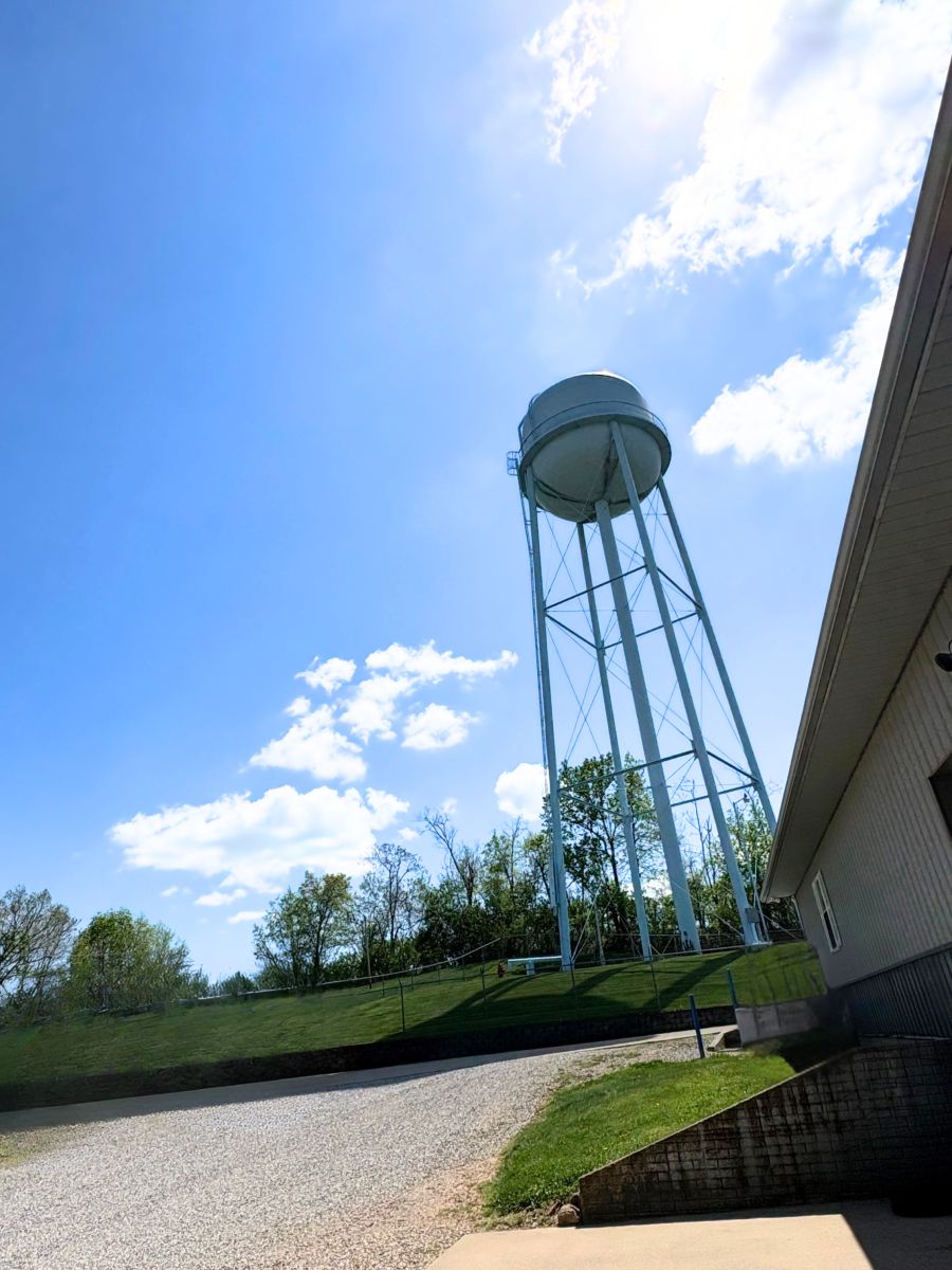 Water tank high above the trees.